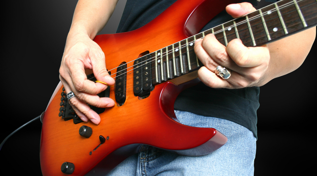 10 Stretches To Improve Your Guitar Skills and Keep You Healthy