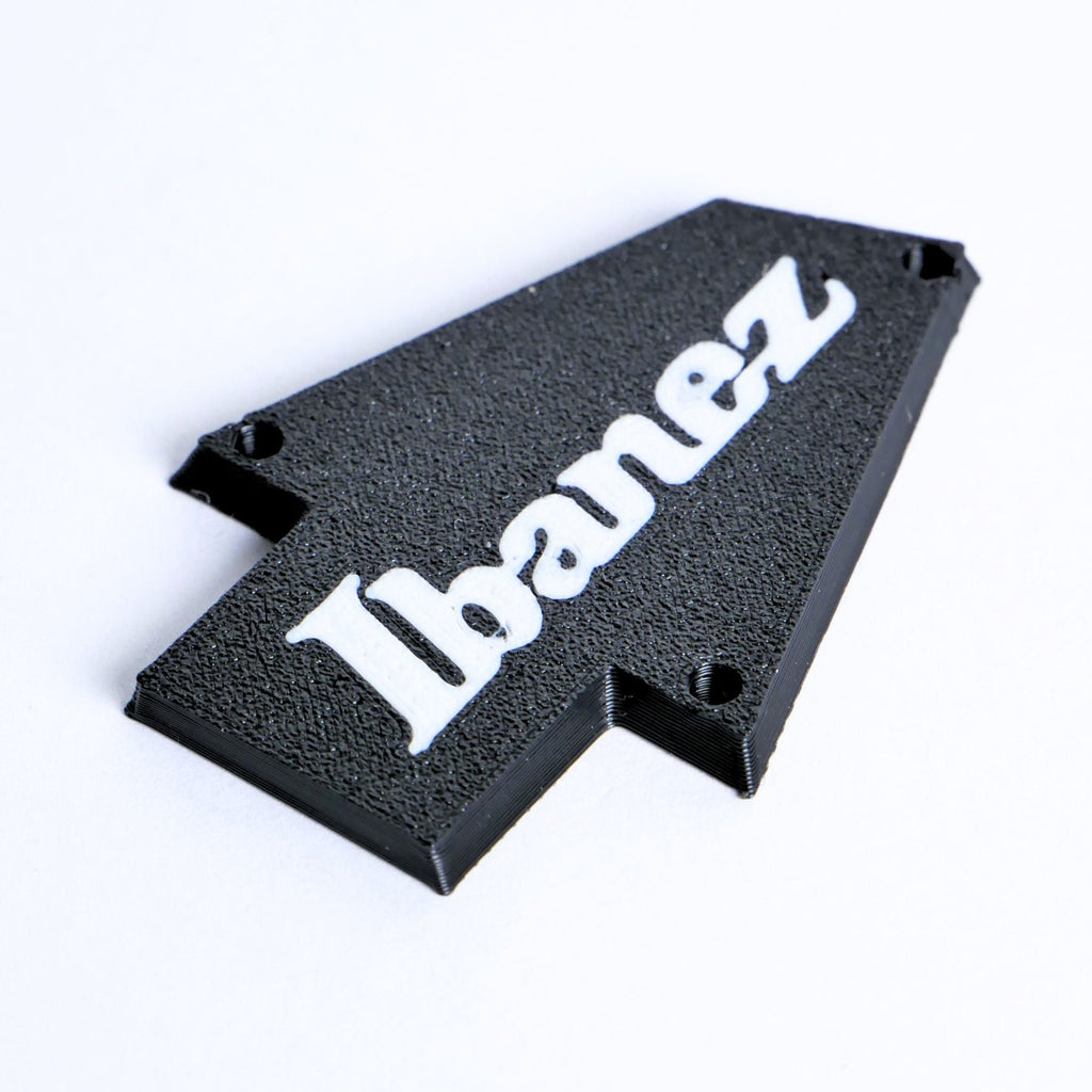 Custom Ibanez Truss Rod Cover for RG & JEM – Classic Logo (White & Black) - Ploutone