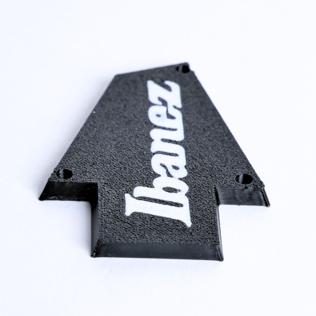 Custom Ibanez Truss Rod Cover for RG & JEM – Classic Logo (White & Black) - Ploutone