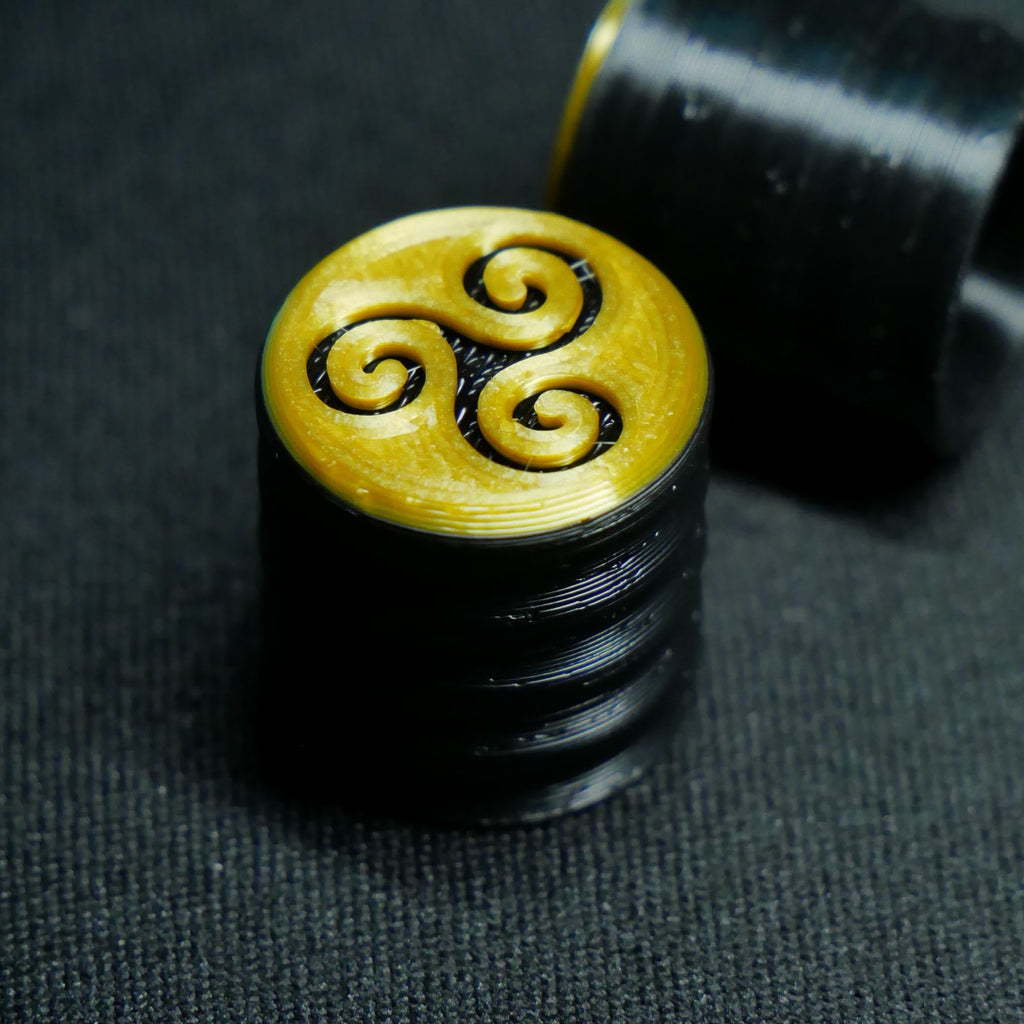 Opus Guitar Knobs - Gold and Black Triskele Sigil